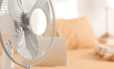 fan in bedroom indicating the room is too hot